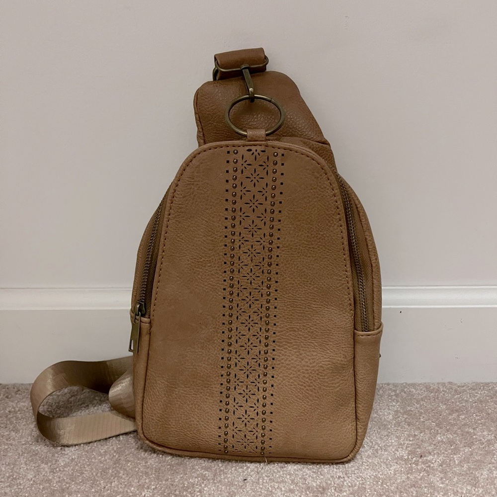 Camel colored crossbody bag.